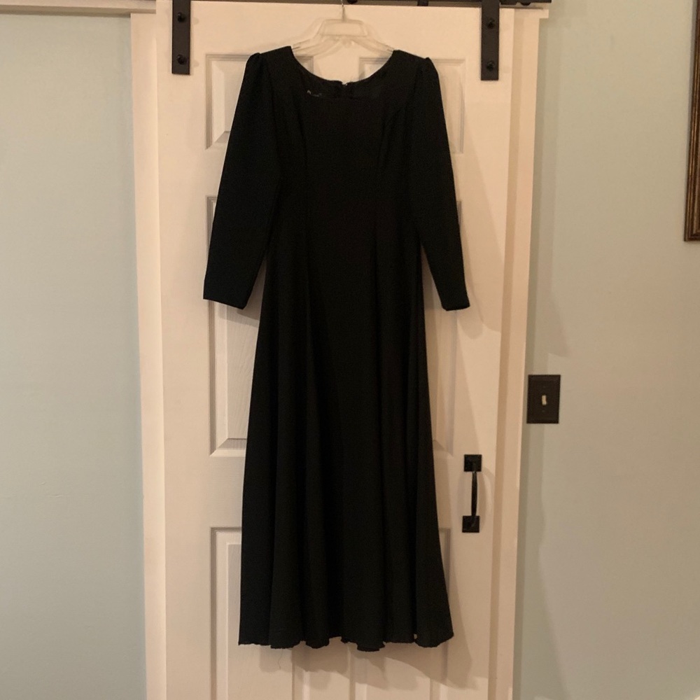 Rivar’s Black Floor Length, Fit & Flare Dress